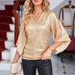 Céline | Glamour-Bluse – Ausgestellte Ärmel und glitzernde Details 