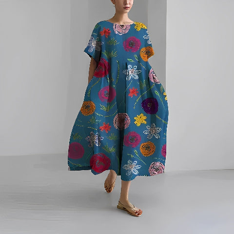 Dorothée | Lång Klänning Med Mönster – Rymlig Och Trendig Design 