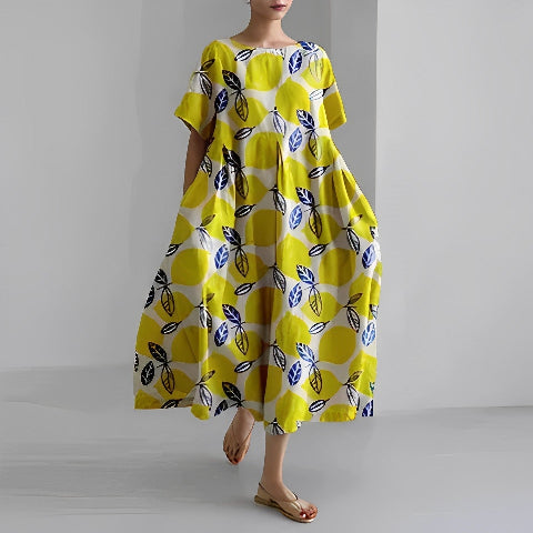 Dorothée | Lång Klänning Med Mönster – Rymlig Och Trendig Design 